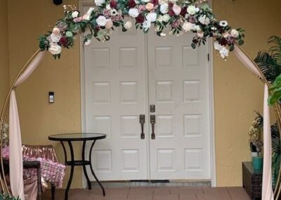 Round Walk-through Arch or backdrop with our faux Floral arrangement