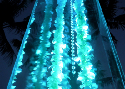 Acrylic Wedding Column Room Decor With Uplights, Gems and Silk Orchids at Grove Isle FL